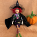 Velora sitting with a pumpkin (sold separately) 